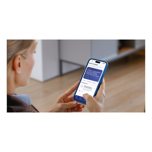 LearnoLo quiz or activity screen shown on an iPhone in hand
